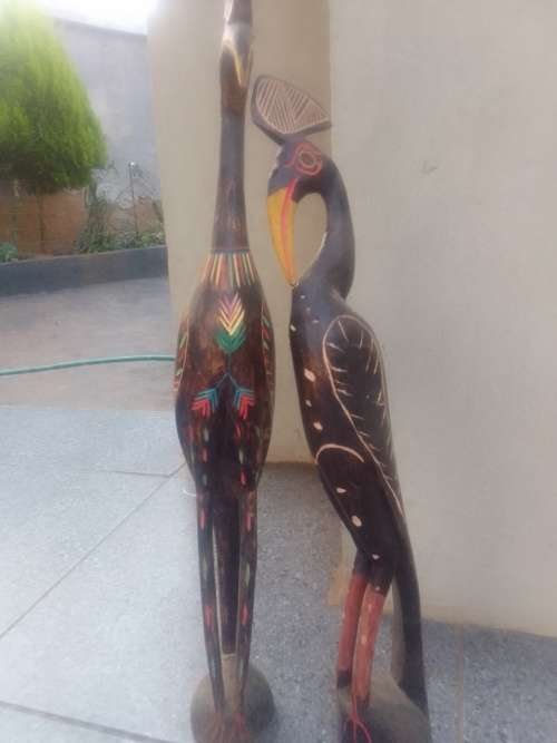 2 wooden birds. 60cm in height