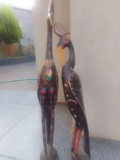 2 wooden birds. 60cm in height