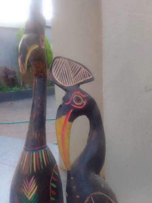 2 wooden birds. 60cm in height