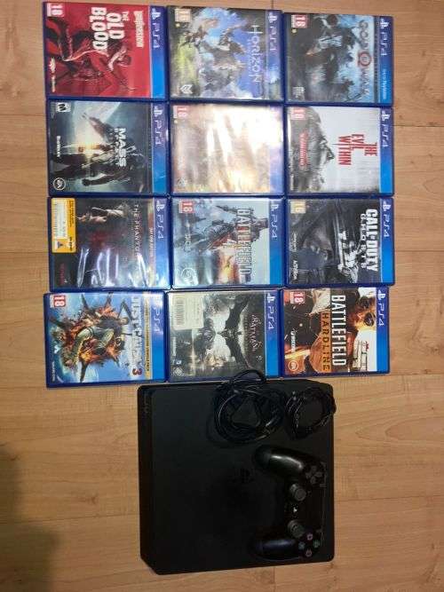 PS4 SLIM-2TB WITH 12 GAMES and Controller