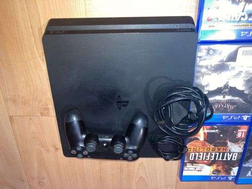 PS4 SLIM-2TB WITH 12 GAMES and Controller