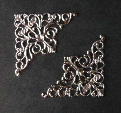 FILIGREE SILVER CORNERS