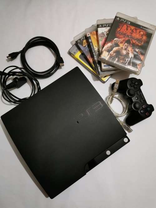 PlayStation 3 + 5 Games!!!