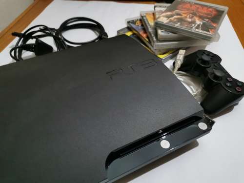 PlayStation 3 + 5 Games!!!