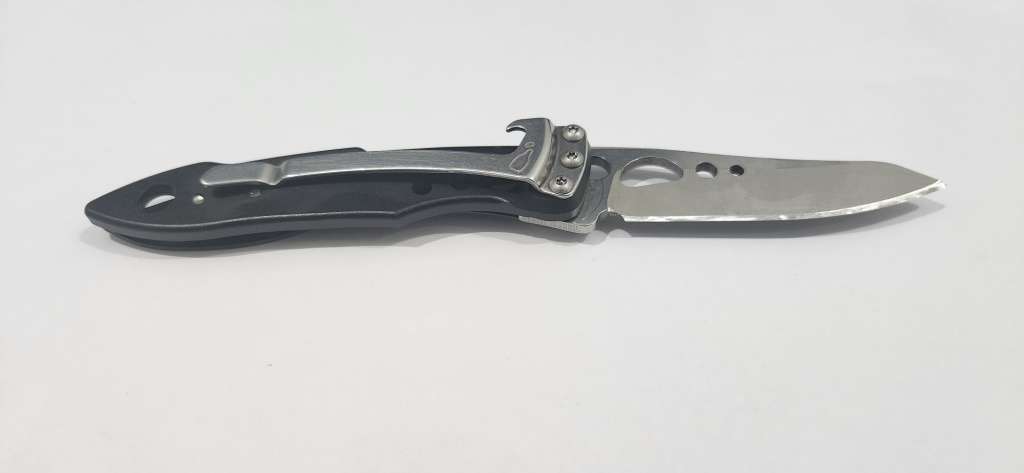 Leatherman Skeletool + olight torch