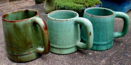 THREE BEAUTIFUL GREEN POTTERY TANKARDS