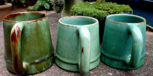 THREE BEAUTIFUL GREEN POTTERY TANKARDS