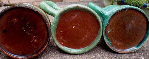 THREE BEAUTIFUL GREEN POTTERY TANKARDS