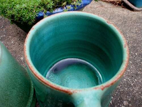THREE BEAUTIFUL GREEN POTTERY TANKARDS