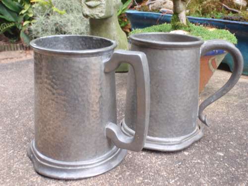VINTAGE - CIRCA 1949 TWO BATTERED OLD PEWTER TANKARDS - COLLECTIBLE, LOADS OF CHARACTER