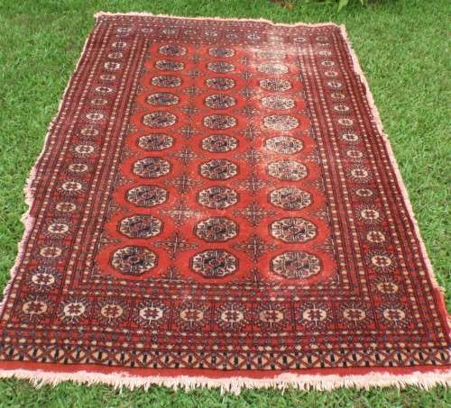 Bukhara hand woven carpet - lovely old character piece - worn, faded, threadbare in places