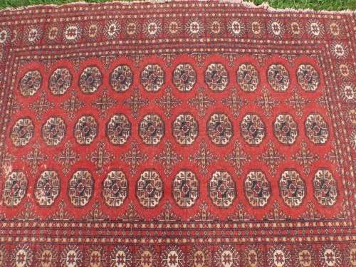 Bukhara hand woven carpet - lovely old character piece - worn, faded, threadbare in places