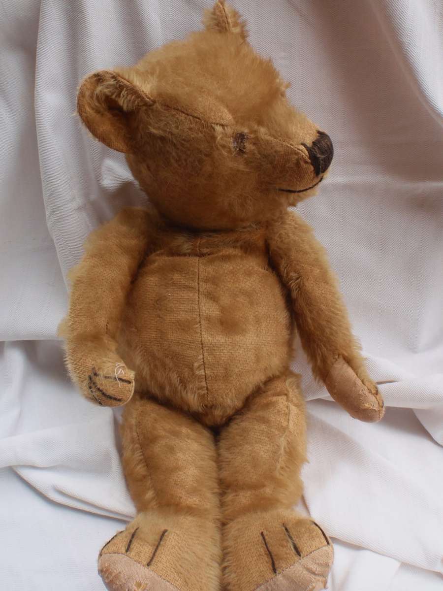 Antique Teddybear, circa 1920s.  Lovely old collectible bear that has survived all these years.