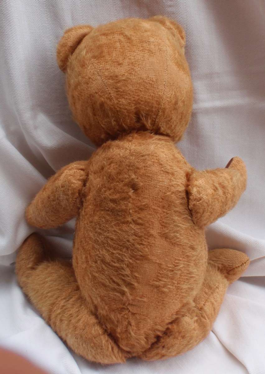 Antique Teddybear, circa 1920s.  Lovely old collectible bear that has survived all these years.