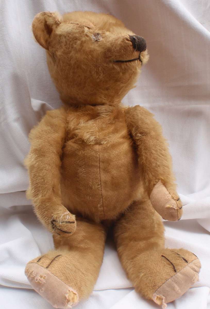 Antique Teddybear, circa 1920s.  Lovely old collectible bear that has survived all these years.