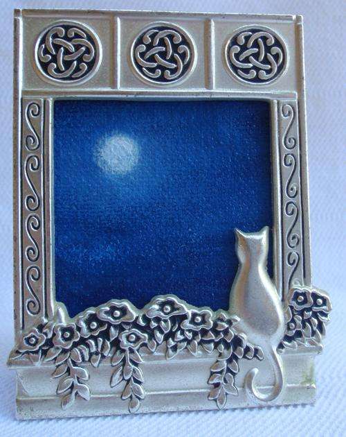 CHARMING ORIGINAL MINIATURE - TABLE STANDING, 'FULL MOON' IN INTERESTING SILVER METAL FRAME.
