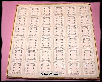 12 Sets of Three Studded Diamante Earrings