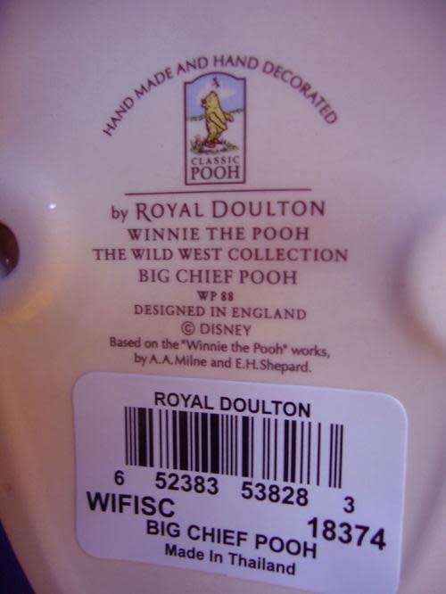 Winnie the Pooh by Royal Doulton - Disney " In The Armchair " *