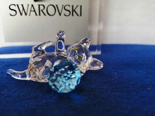 Swarovski Crystal Kitten playing with a blue ball of wool