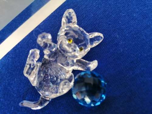 Swarovski Crystal Kitten playing with a blue ball of wool