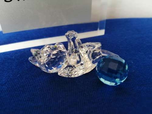 Swarovski Crystal Kitten playing with a blue ball of wool