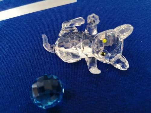 Swarovski Crystal Kitten playing with a blue ball of wool