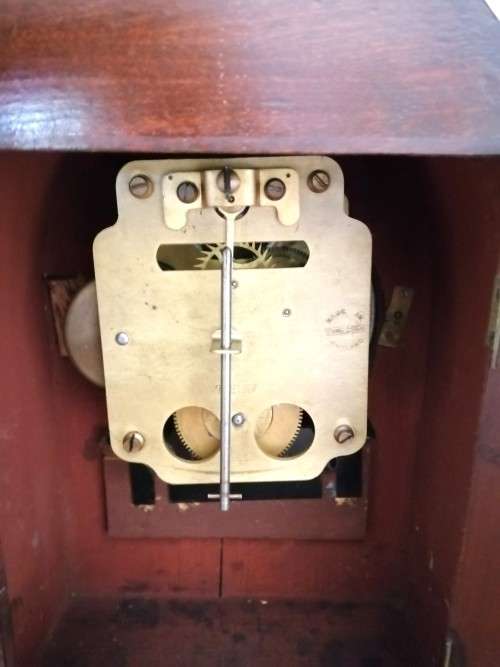 English Tame Side Single Chain Fusee brass bezel in an oak lancet shape case. Mantel Clock