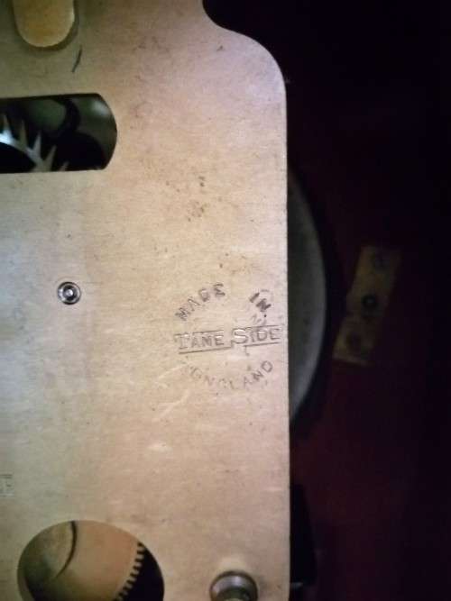 English Tame Side Single Chain Fusee brass bezel in an oak lancet shape case. Mantel Clock