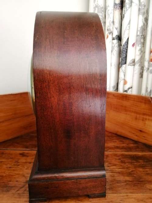 English Tame Side Single Chain Fusee brass bezel in an oak lancet shape case. Mantel Clock