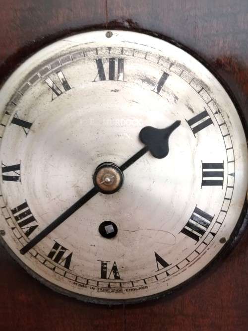 English Tame Side Single Chain Fusee brass bezel in an oak lancet shape case. Mantel Clock