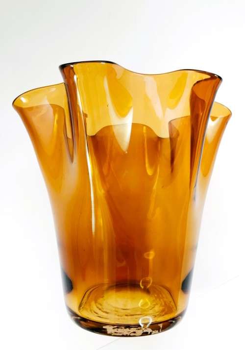 Large Amber glass vase has a unusual handkerchief shape