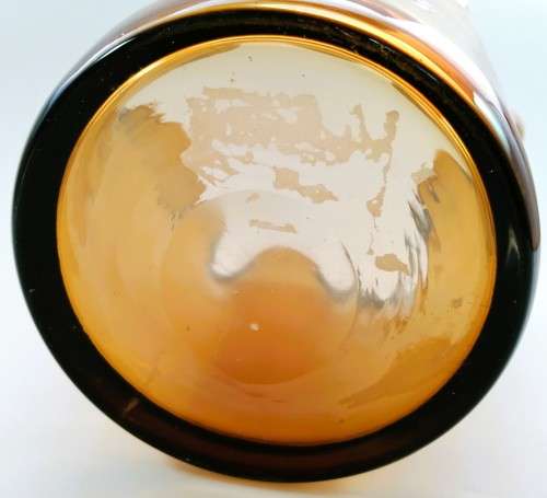 Large Amber glass vase has a unusual handkerchief shape