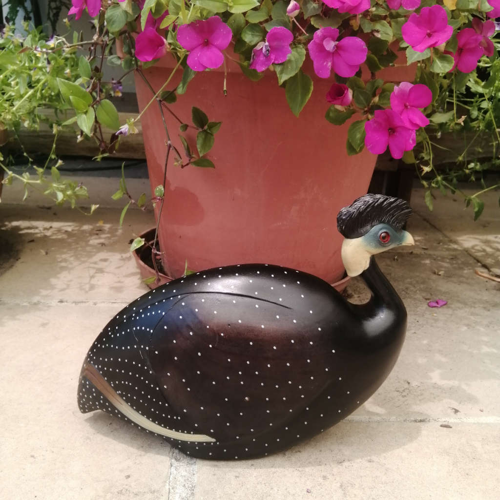 Feathers of Knysna Gallery carved and hand painted Female Guinea Fowl Fossils