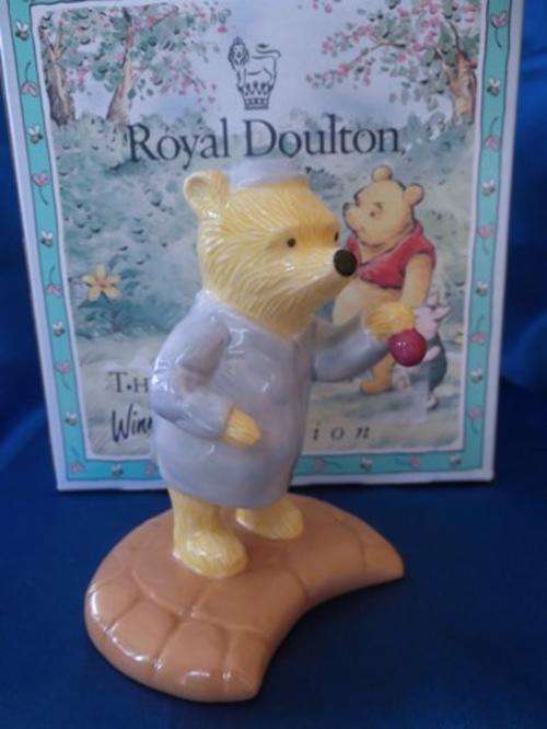 Winnie the Pooh by Royal Doulton - Disney " A Little Tree Trimming is in Order "