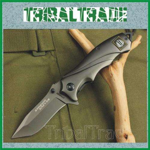 3 to Go!! STRIDER 313 LINER LOCK TITANIUM FINISH FLICK BLADE KNIFE with a Belt Clip.