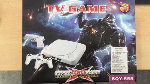 TV GAME CONSOLE WITH REMOTES AND GUN (Super Mario, Galaxian and so much more)