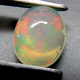 STUNNING 0.96 CT NATURAL RAINBOW FIRE OPAL!