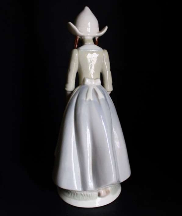 Dutch Girl with Duck - Heritage Porcelain.