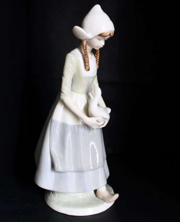Dutch Girl with Duck - Heritage Porcelain.