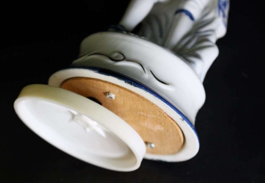 Rotating Musical Man Figurine