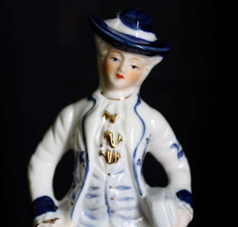 Rotating Musical Man Figurine