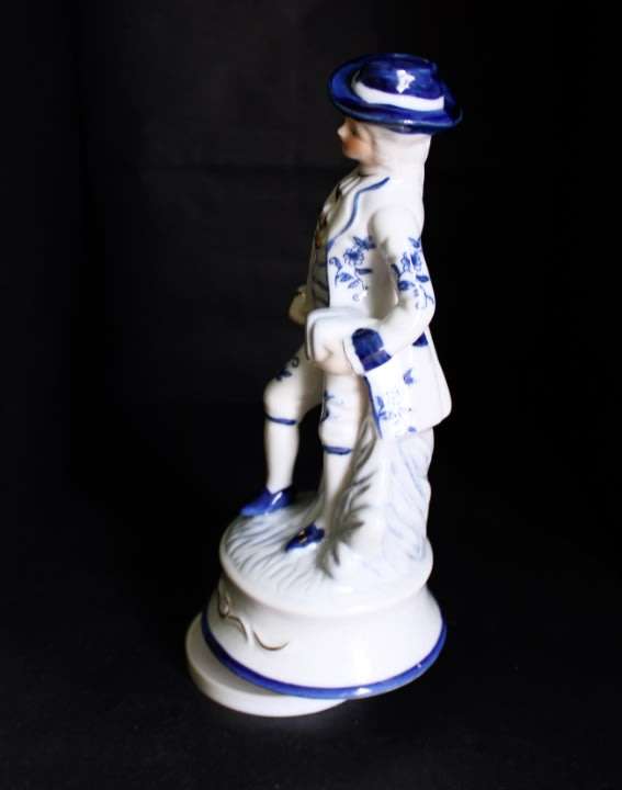 Rotating Musical Man Figurine