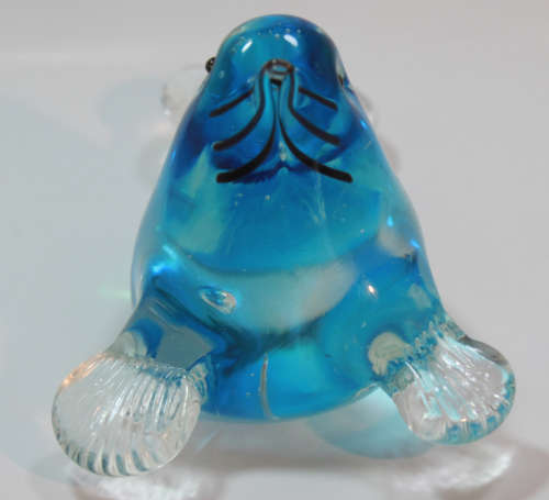 Playful Baby Seal Glass Ornament in Blue