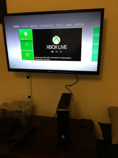 Xbox 360 Slim with 2 controllers