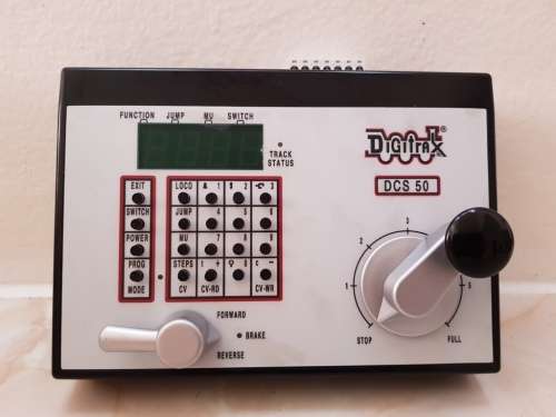 Digitrax DCS50 All-in-one Command Station/Booster/Throttle, c/with Power Supply.