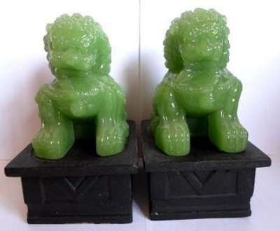 Superb pair of large green Chinese Peking Glass Temple Foo Dogs on camphor wood stands