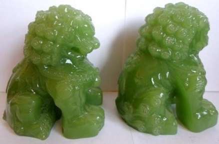 Superb pair of large green Chinese Peking Glass Temple Foo Dogs on camphor wood stands