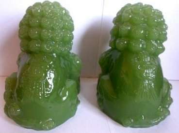Superb pair of large green Chinese Peking Glass Temple Foo Dogs on camphor wood stands
