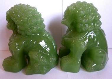 Superb pair of large green Chinese Peking Glass Temple Foo Dogs on camphor wood stands