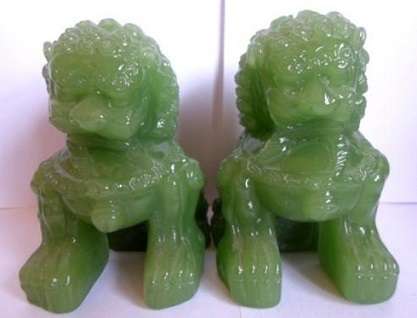 Superb pair of large green Chinese Peking Glass Temple Foo Dogs on camphor wood stands